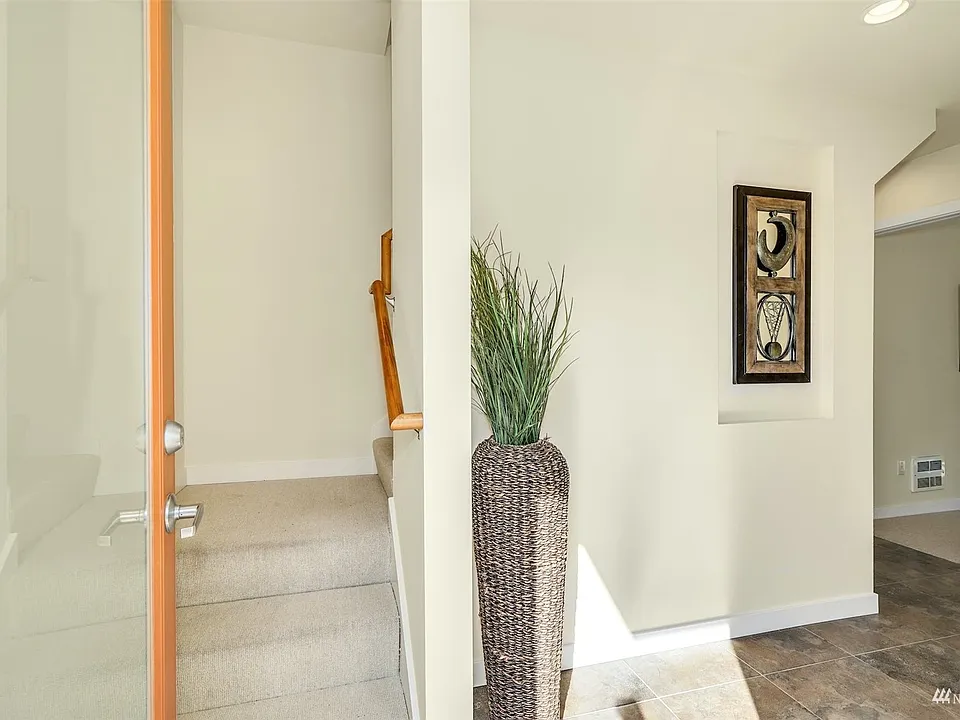 Formal entryway for hanging coats and removing shoes.>