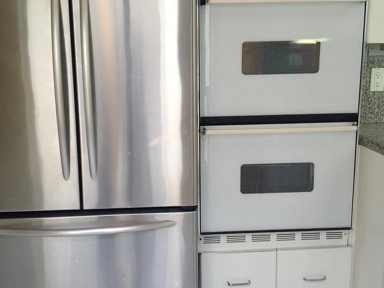 double oven & stainless steel refrigerator
