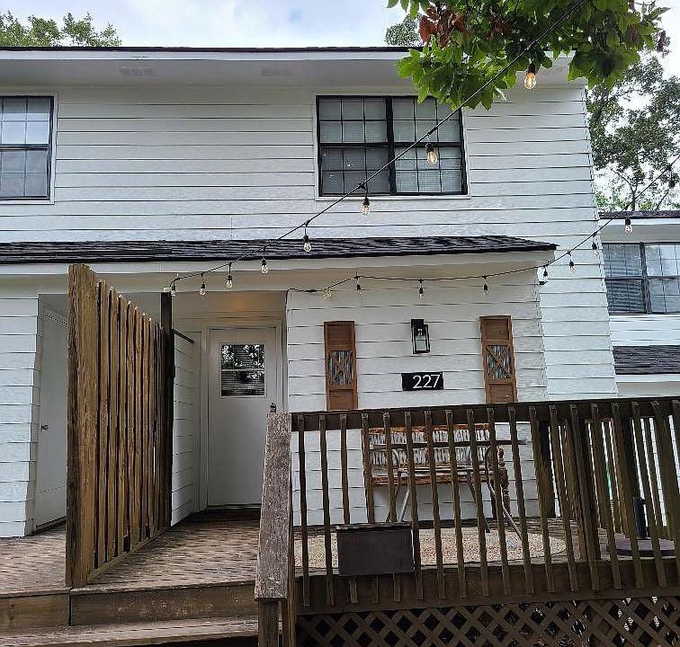 Nice rear deck area and storage room too! This is an Airbnb Model (not for lease).