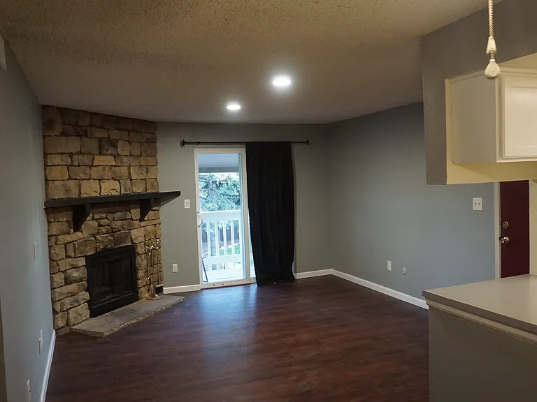 Large Living room with a fireplace and an open layout!