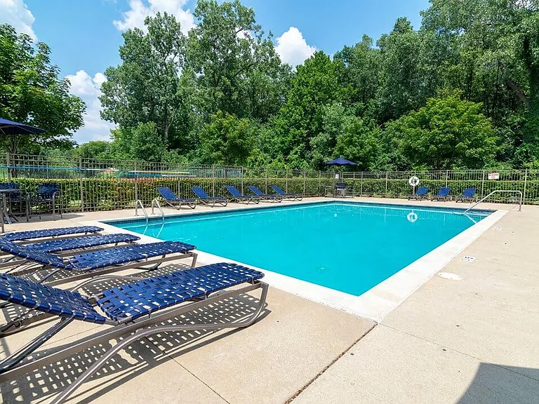 Take a Dive in Our Sparkling Swimming Pool