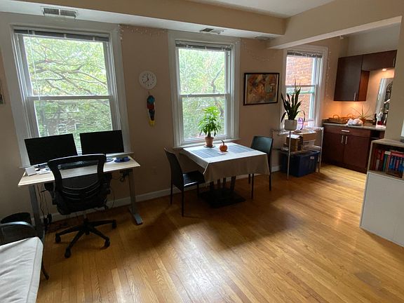 Enjoy bright third-story views of the tree canopies while teleworking or enjoying a meal