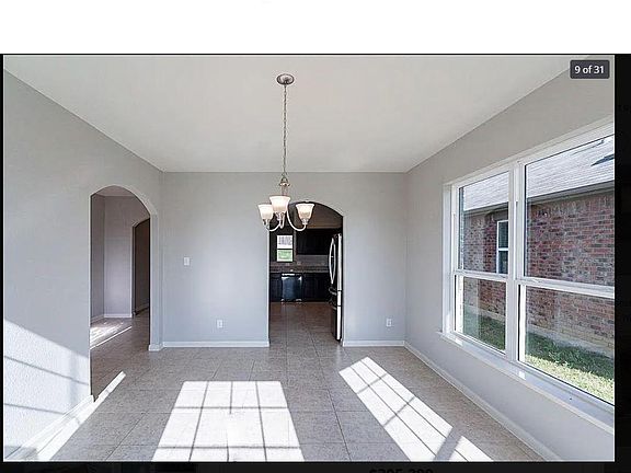 Secondary view of this gorgeous dining room.