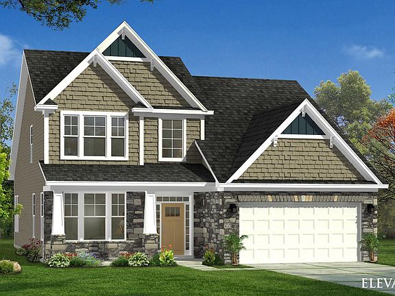 Middleton Elevation 5 with partial stone, covered entry and 2 car garage