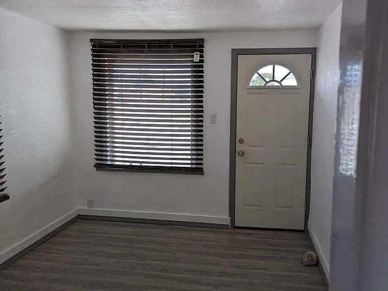 Living Room with window blinds.