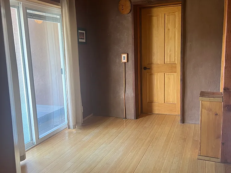 Sliding glass doors leading to balcony