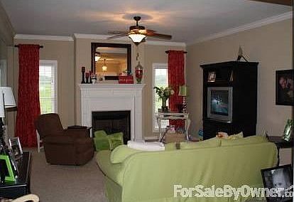 Living Room
						:
						This is the view of the living room from the dining room. Gas fireplace.
