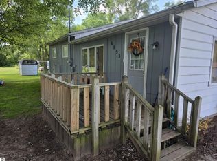 6053 NW Mill St, Riverdale, MI 48877