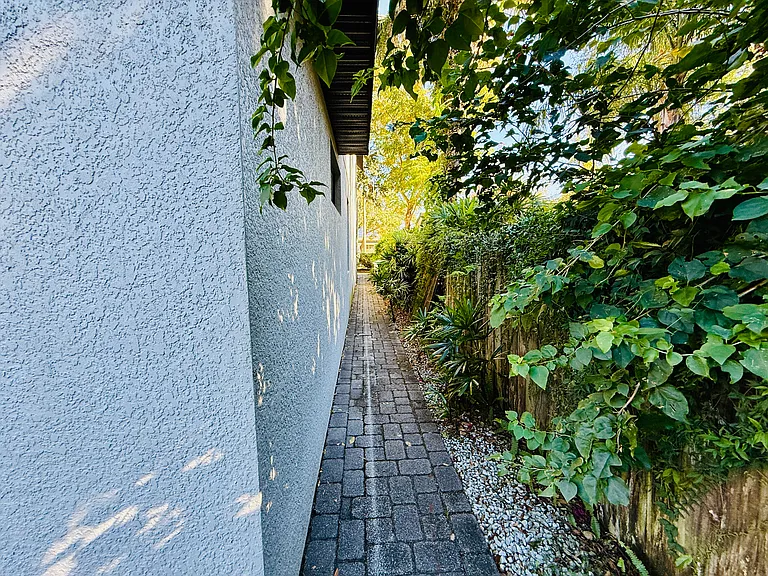 Big Fence in Back Yard house paved all around