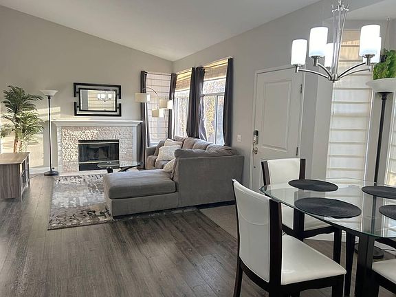 Common area is partially furnished. Comes with kitchen table and chairs. Couch and wool rug have coffee table, end table, and TV stand. Can be flexible on removing some furniture as needed.