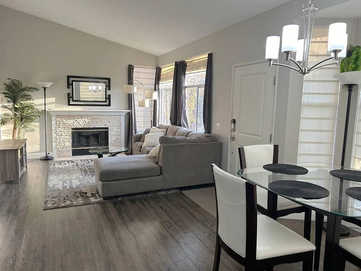 Common area is partially furnished. Comes with kitchen table and chairs. Couch and wool rug have coffee table, end table, and TV stand. Can be flexible on removing some furniture as needed. - 19431 Rue De Valore #33D