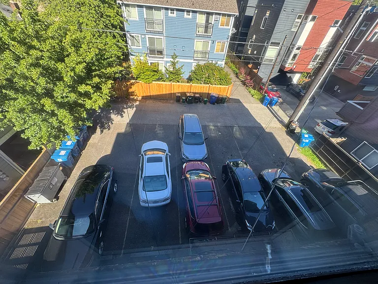 Parking spaces from primary bedroom. Two reserved spaces (front to back) assisgned to the apartment.