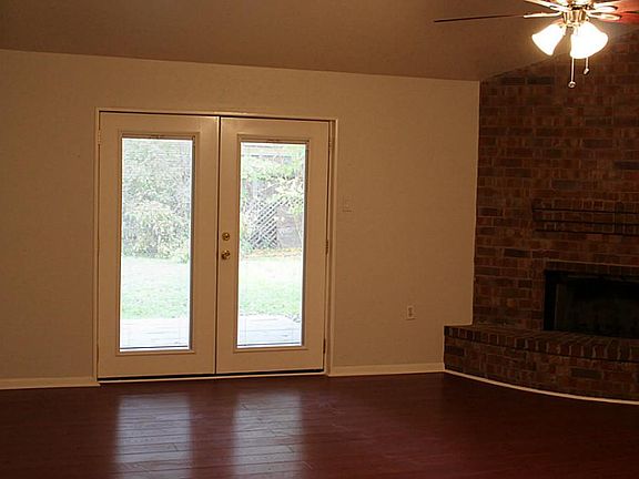 Den and Double Glass Doors to the Patio