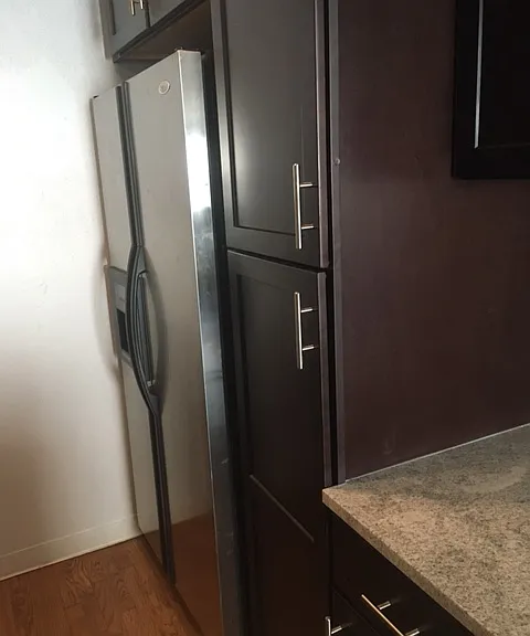 Kitchen pantry and double door fridge.