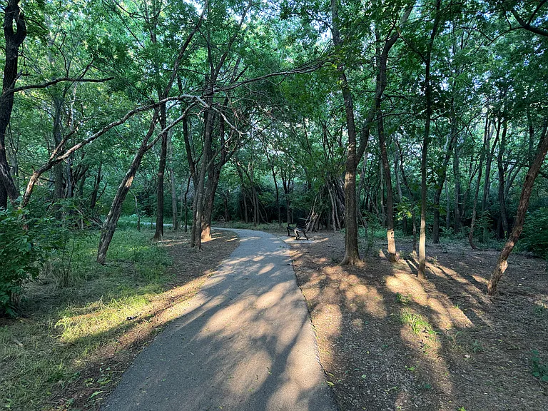 Trail in wilderness area next to neighborhood