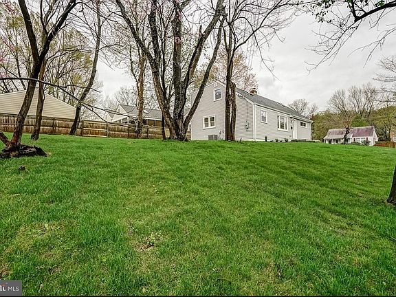 Side yard; we have since added a fence and there is now a fully fenced in backyard.
