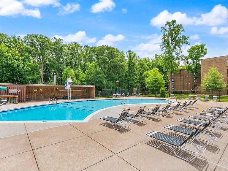 Community pool at the foot of the building, with no additional membership fee.