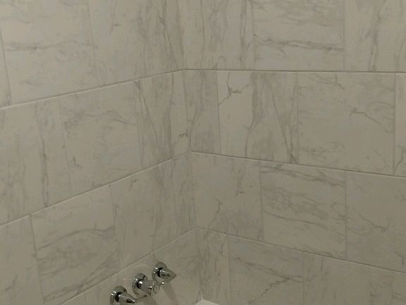 Tub/ shower new tile