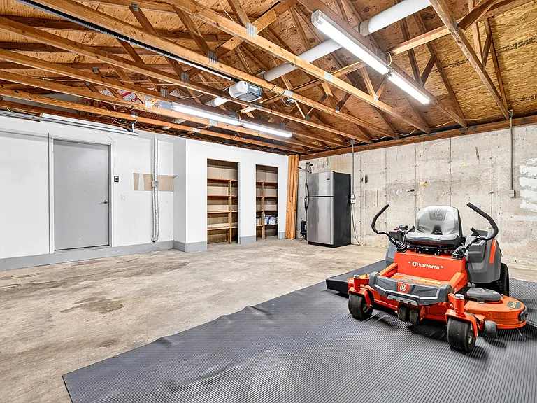 Freezer stays for Tenant use!
Lawnmower will be moved before tenant occupies.