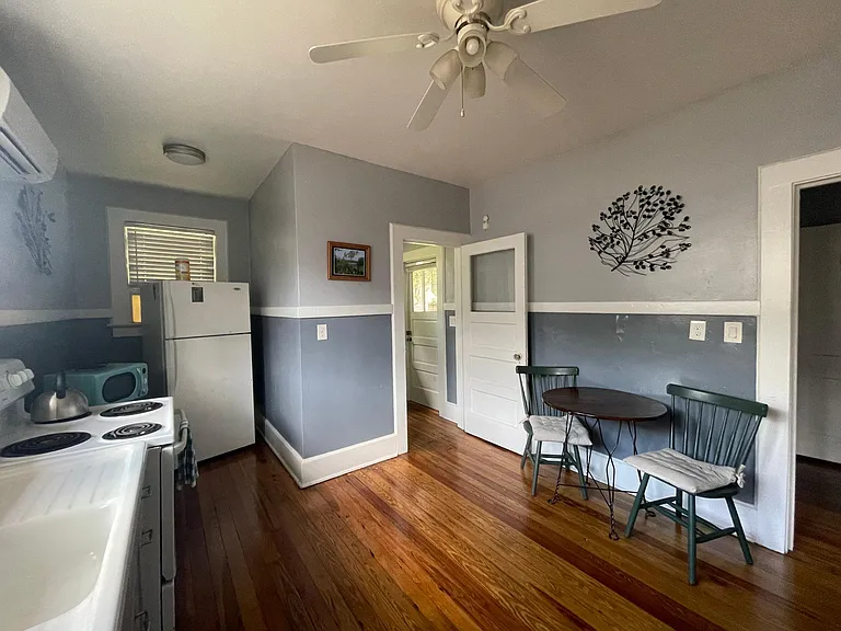 At the back of the house and back of the kitchen is the laundry room.