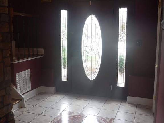 Large Ceramic Tiled Foyer