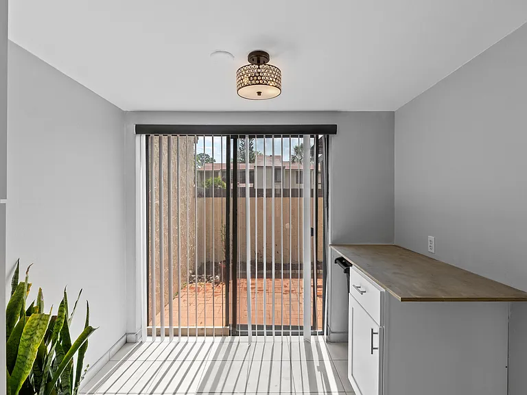 Extra storage for Garbage area. Sliding Door to Front Porch