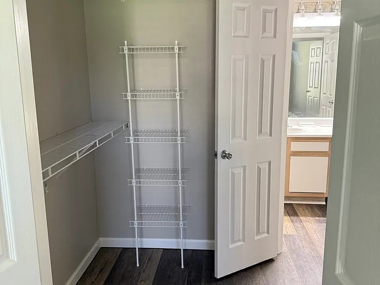 Walkin Closet connected to Bedroom and Bathroom.