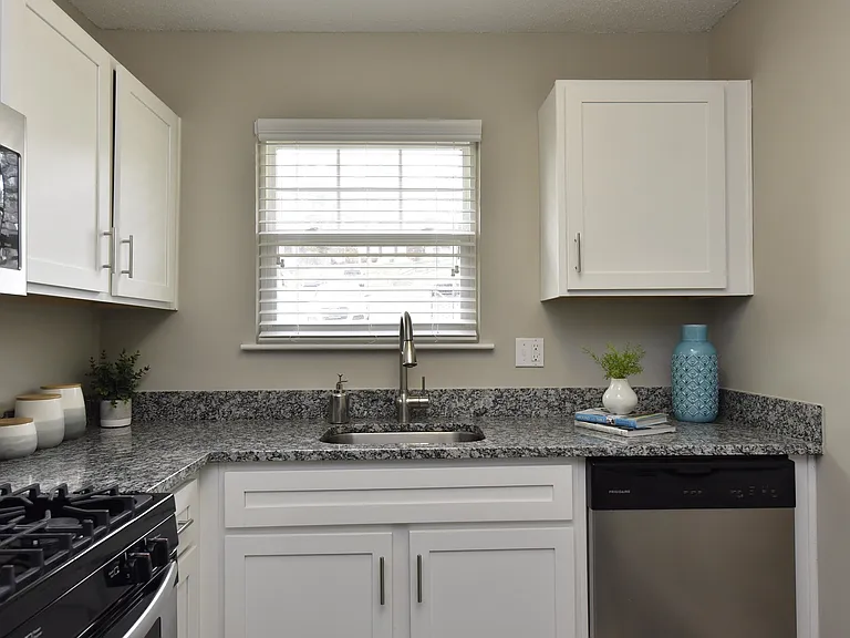 Step into elegance with this modern kitchen design, perfect for culinary creativity.