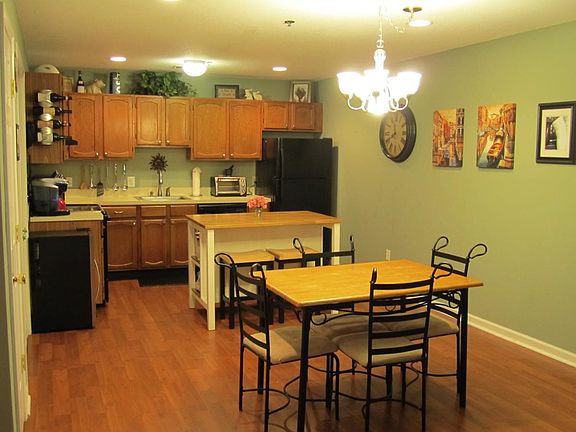 Kitchen, furnished with island & stools, kitchenette set, an