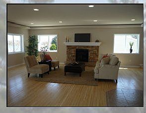 Living Room With Fireplace And Bamboo Floors