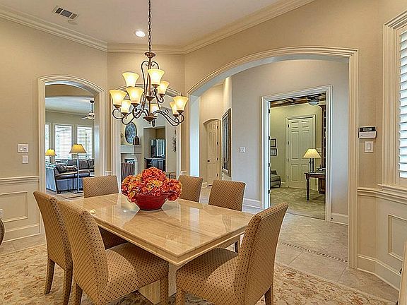 Three arches make the dining room a very open space.