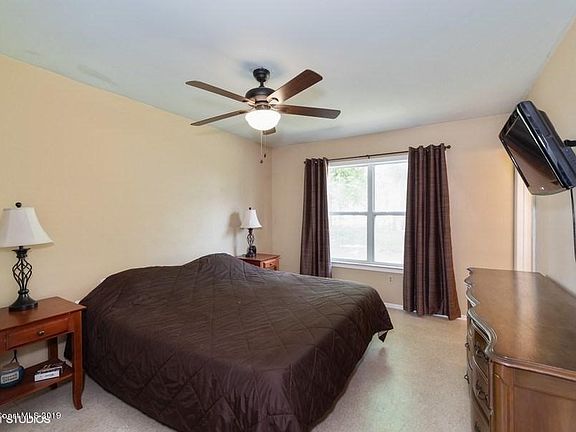 05_1313NECromeyRdNE_14_MasterBedroom_Low