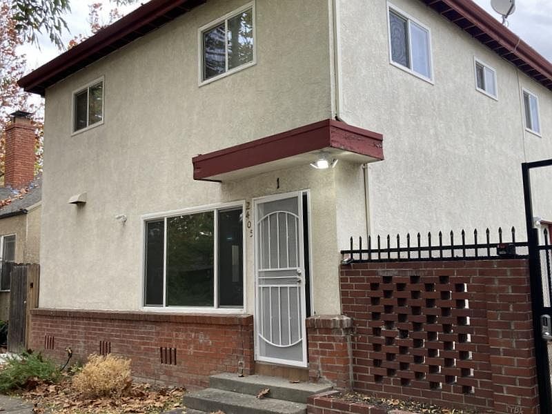 The front door of 2405 V St #1