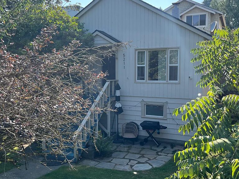 Private yard and patio space with beautiful vegetation