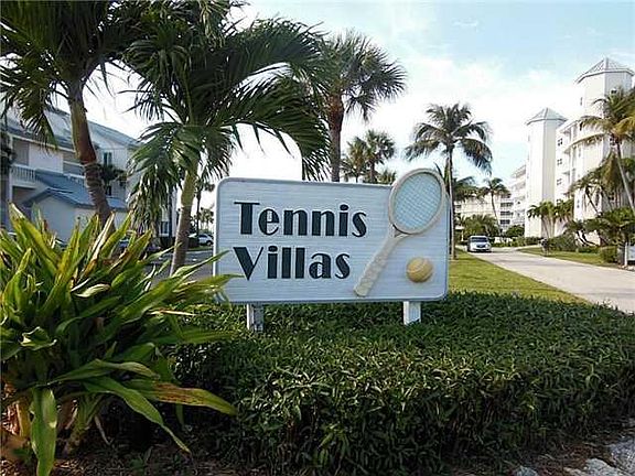 Exterior Front. Entrance to Tennis Villas - across the road from the ocean.