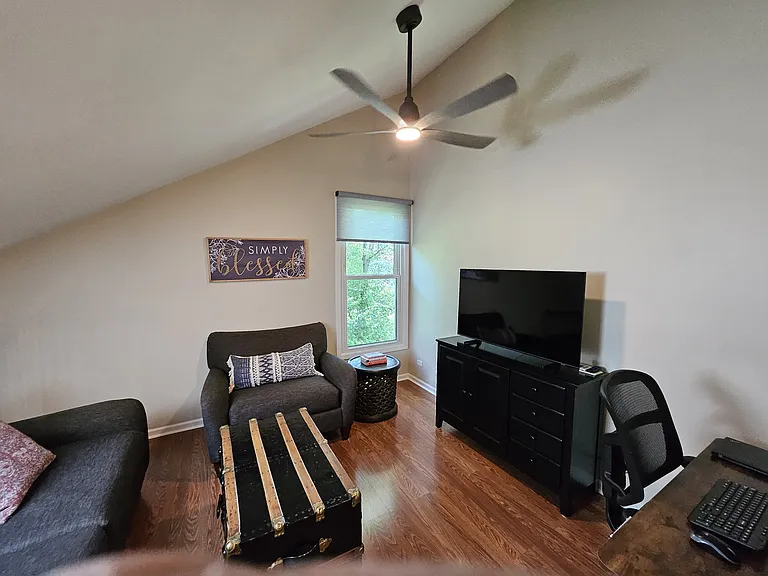 Ceiling fan with light in loft