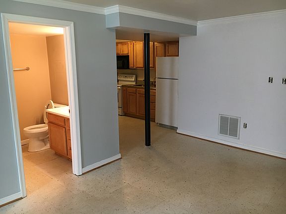 From living room toward kitchen and bathroom