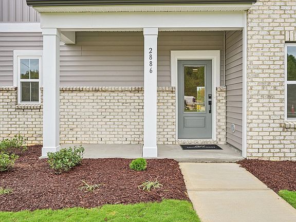 Exterior - Earthy tones and clean lines feel quietly inviting.