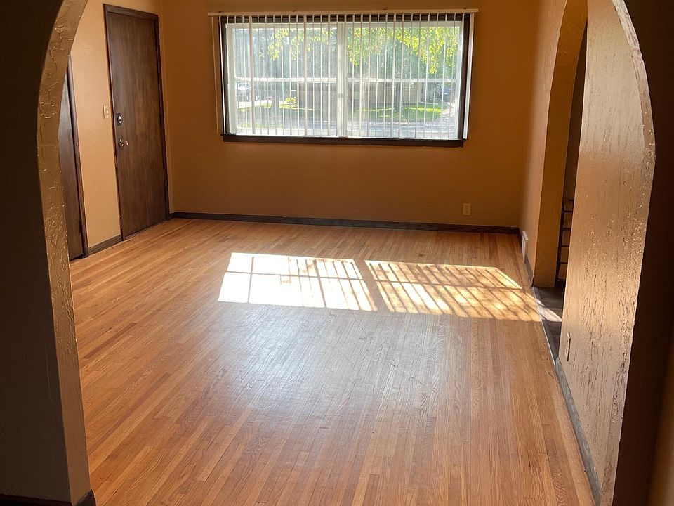 Upstairs living room. Lots of natural light. Hardwood floors.