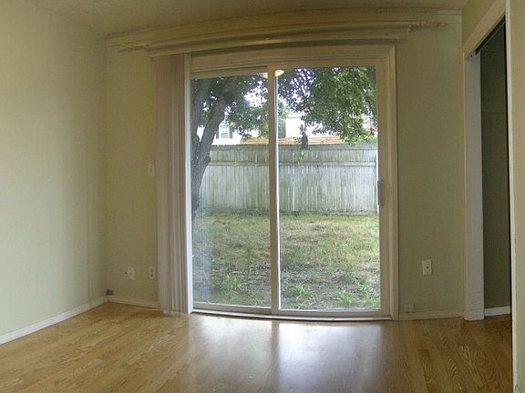 Bedroom w/Sliders to Private Patio and Yard