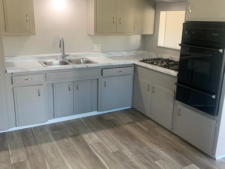 Recently updated kitchen with vinyl plank flooring