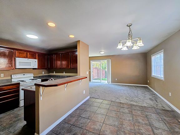 kitchen,living room, dining room with breakfast bar