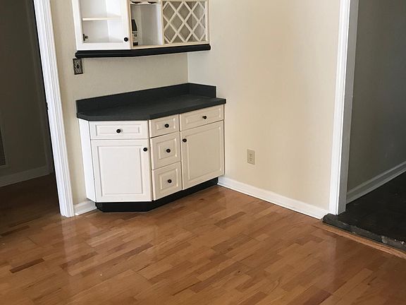 Corner Bar & Liquor Storage- Den