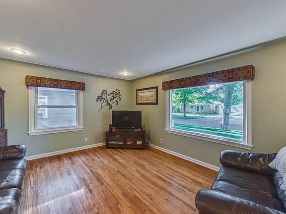 Tons of natural light and beautiful wood floors in the Living Room