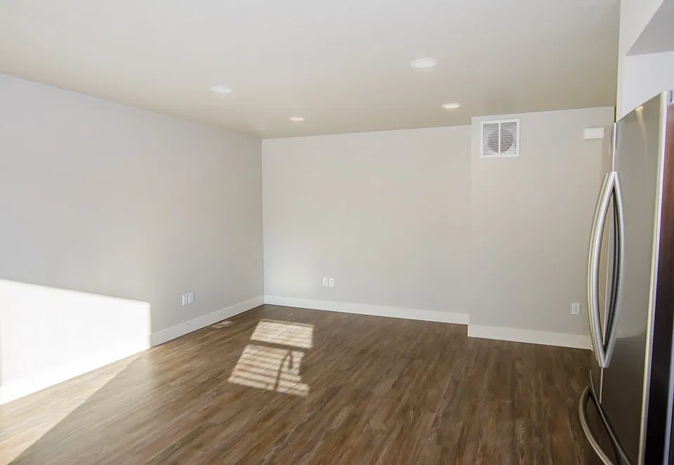 Kitchen looking into living room