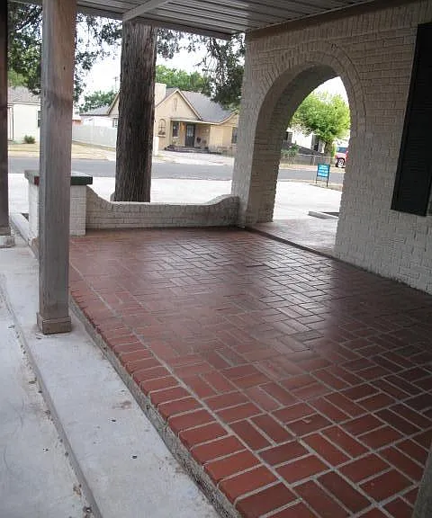View from the covered front porch to the street and parking