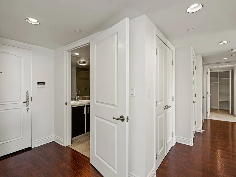 Front Entrance with Hall Bathroom and Vinyl Flooring