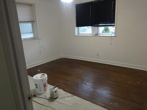 Front bedroom facing street and front door (1 of 2 bedroom)