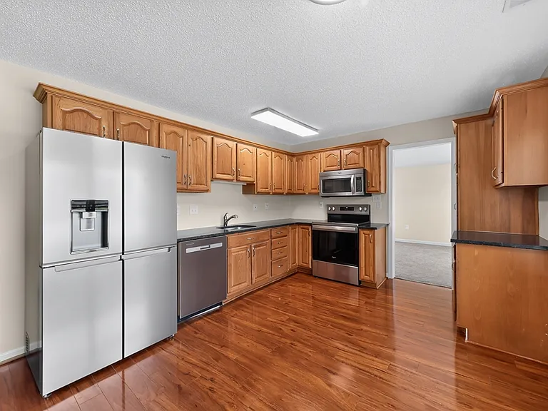 Eat-In Kitchen w/ SS Appliances