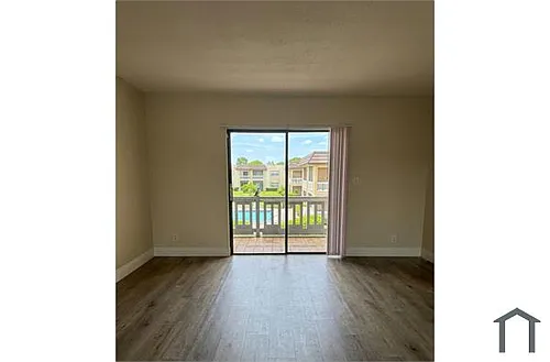 5861 NW 16th Pl #303 Photo 1